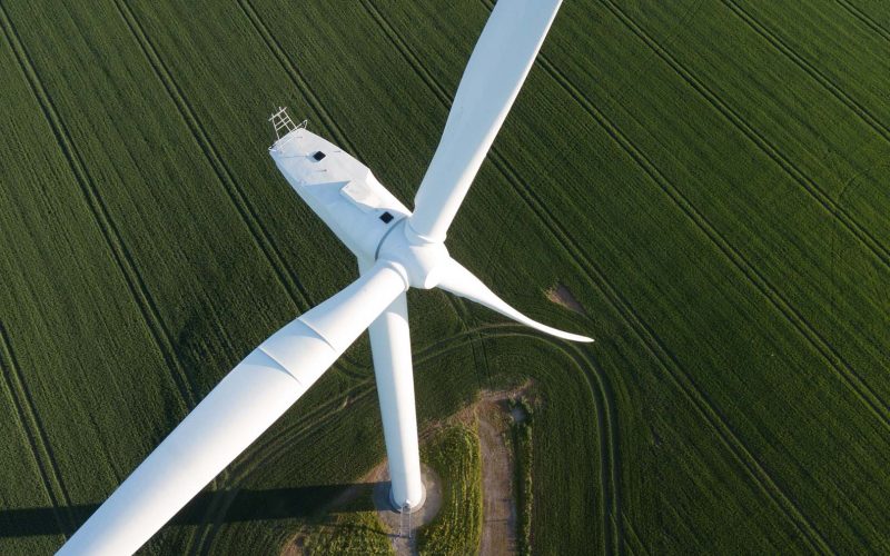 Wind turbines providing renewable green energy in engl